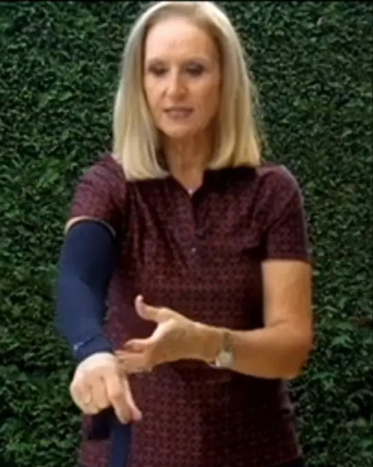 Tracy wearing a dark arm sleeve in her original IceRays testimonial.